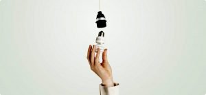 Picture of a person fitting a bulb