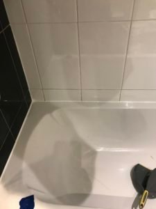 Fresh new silicon around bathtub